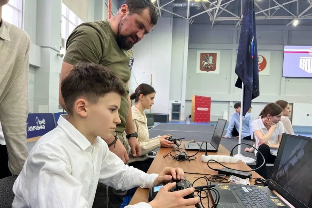 Student tries operating a drone